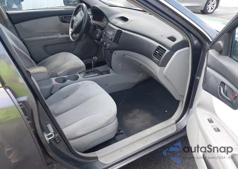 2008 Kia Optima Lx z USA, uszkodzony, nr VIN KNAGE123285177612